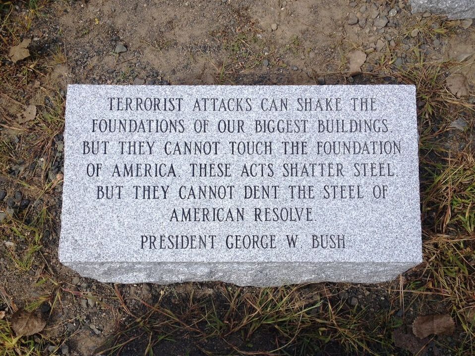 Belleville 9/11 memorial Barre Grey granite bevel marker with engraved quote.