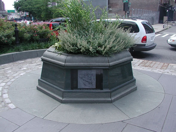 Canal Street Park NYC etched black granite plaque mounted in planter.