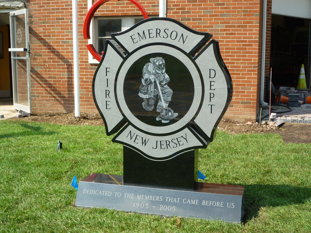 Emerson, NJ Fire Department Memorial a polished black granite Maltese cross with laser etchings